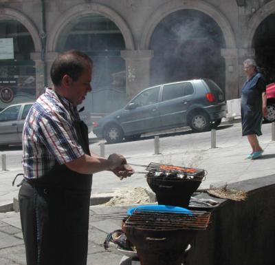 Cooking Sardines outdoors